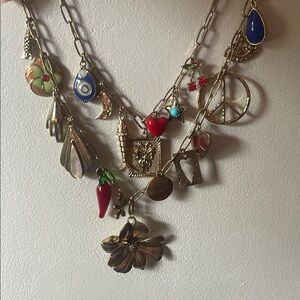 FREE PEOPLE Gold Layered Charm Necklace with Artistic Flair